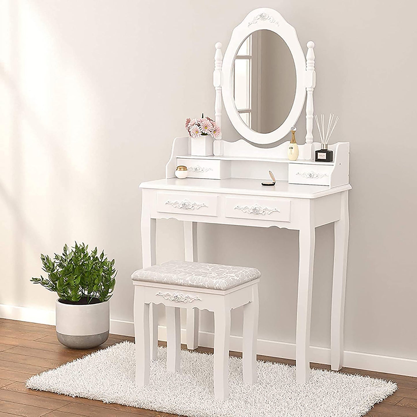 Elegant Vanity Table with Rotating Mirror, 4 Drawers, and Cushioned Stool